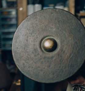Gong being played